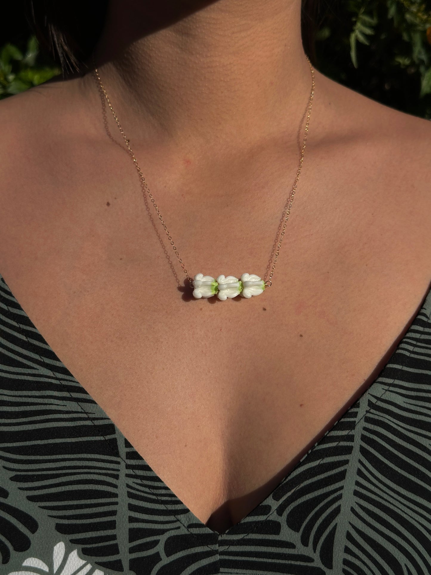 Triple puakalaunu chain